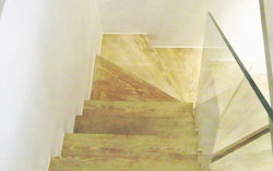 Staircase finished with white silicone sealant